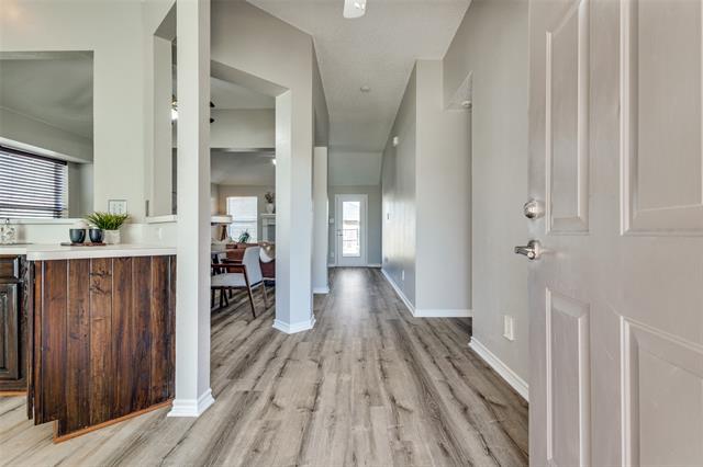 Unwinding by the cozy family room fireplace, this home offers the perfect setting for both entertaining and relaxation