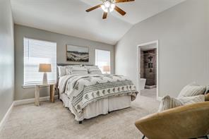 The primary bedroom is a private retreat, thoughtfully separated from the secondary bedrooms for ultimate privacy.