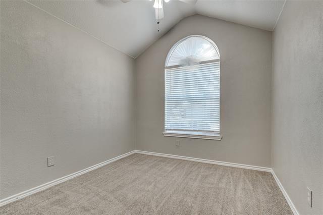 The recently updated secondary bathroom exudes modern elegance, featuring a sleek walk-in shower with updated fixtures and contemporary lighting. The comfort-height toilet offers added convenience, while the headknocker cabinet provides smart storage solutions, making this space both stylish and functional.