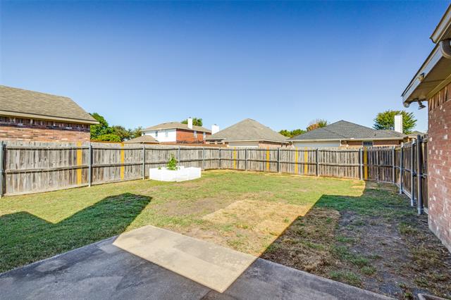 Step into the spacious backyard, fully enclosed by a wood fence with steel posts for added durability and strength, ensuring long-lasting protection. The raised garden beds are a charming addition, and the owner is gifting you a thriving starter garden with fresh basil, rosemary, and pepper plants—perfect for the aspiring gardener or anyone who loves homegrown produce. This outdoor space offers both relaxation and the opportunity to cultivate your own garden oasis.