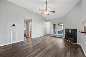 Kitchen featuring sink, stainless steel appliances, gas stove, wood look counters, pantry, and white cabinets