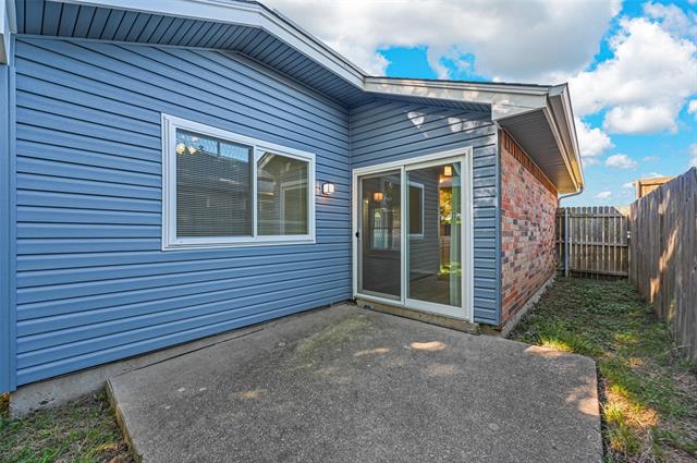 Back yard and a patio area