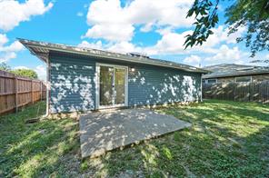 2 Car Garage with Laundry area featuring washer and clothes dryer space - Washer - Dryer Negotiable