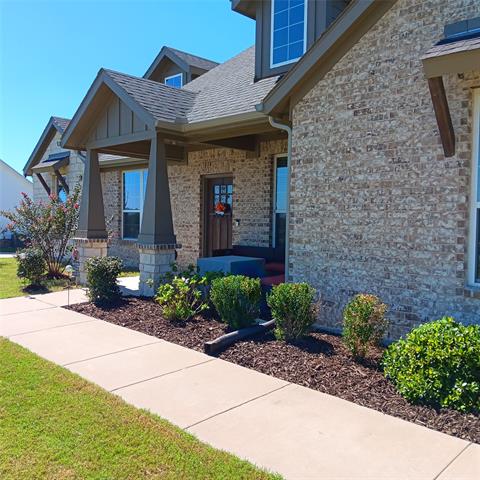 Covered front porch and front walkway