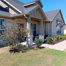 View of backyard with a rural view