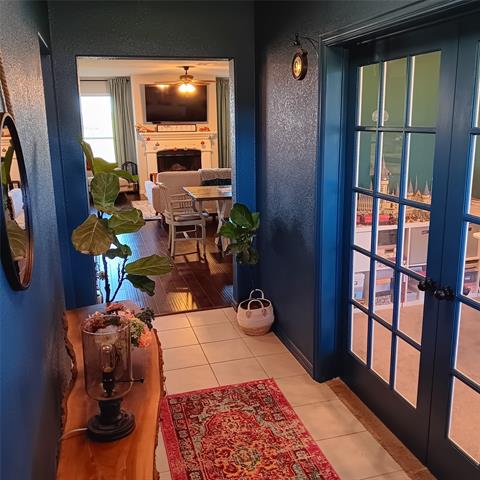 Foyer featuring French doors to bonus room (office)