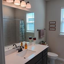 View of carpeted bedroom #4